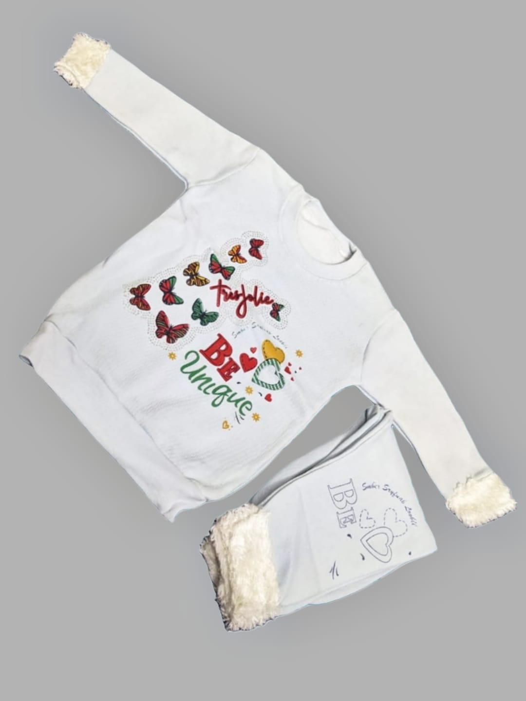 Be Unique" Butterfly & Fur Trim Set